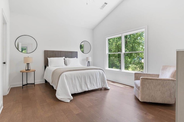 3610 Burnt Bridge Rd, Cumming, GA 30028 - bedroom with wood finished floors, high vaulted ceiling, and baseboards