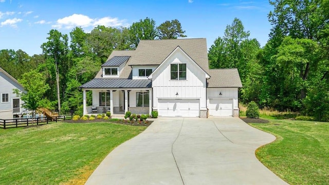 3610 Burnt Bridge Rd, Cumming, GA 30028 - modern farmhouse style home featuring covered porch, board and batten siding, driveway, a standing seam roof, and metal roof