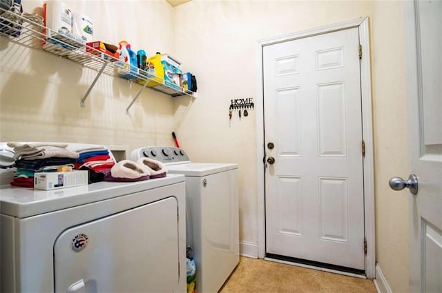 laundry room with washer and dryer