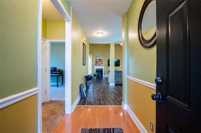 hall featuring wood-type flooring