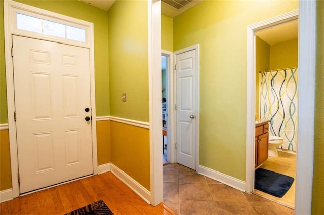 entrance foyer with light hardwood / wood-style floors