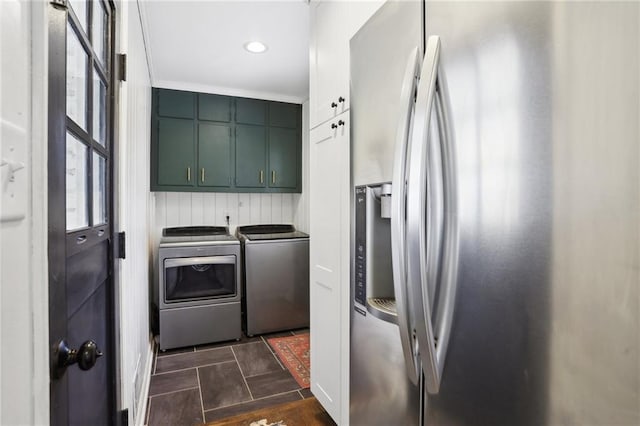 laundry area with cabinets and separate washer and dryer