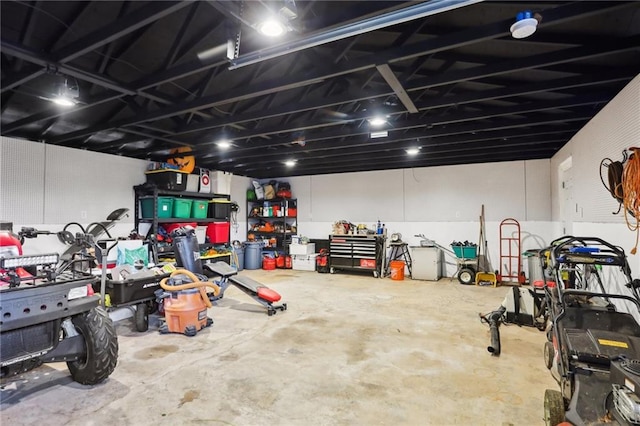 garage with a workshop area