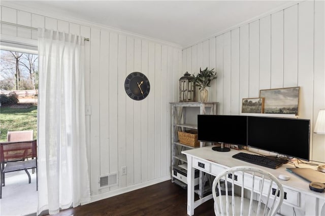 home office featuring ornamental molding and dark hardwood / wood-style floors