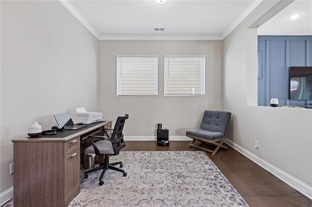 office space featuring baseboards, visible vents, dark wood-style flooring, and crown molding
