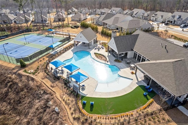 birds eye view of property with a residential view