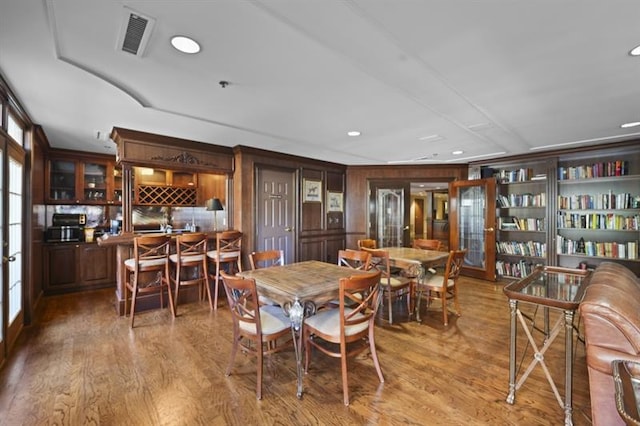 dining area with french doors, recessed lighting, visible vents, and light wood-style floors