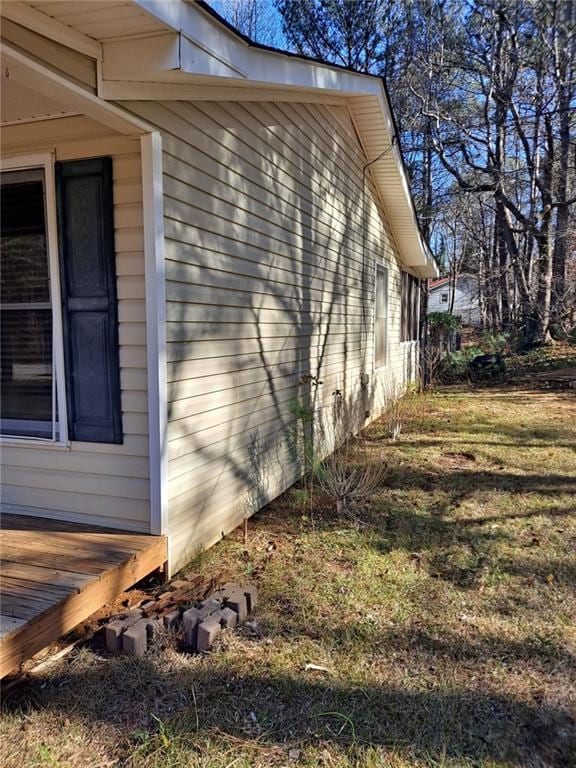 view of home's exterior with a deck