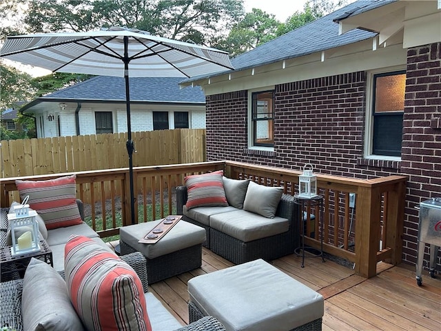 deck with an outdoor hangout area