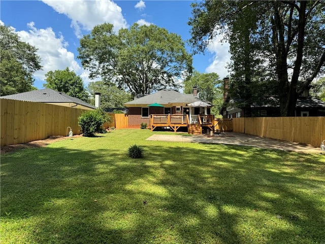 view of yard featuring a deck