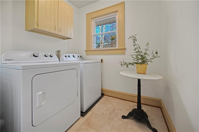 bedroom with multiple windows, wood finished floors, and baseboards