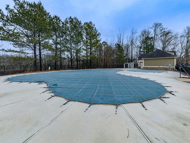 view of swimming pool with a patio