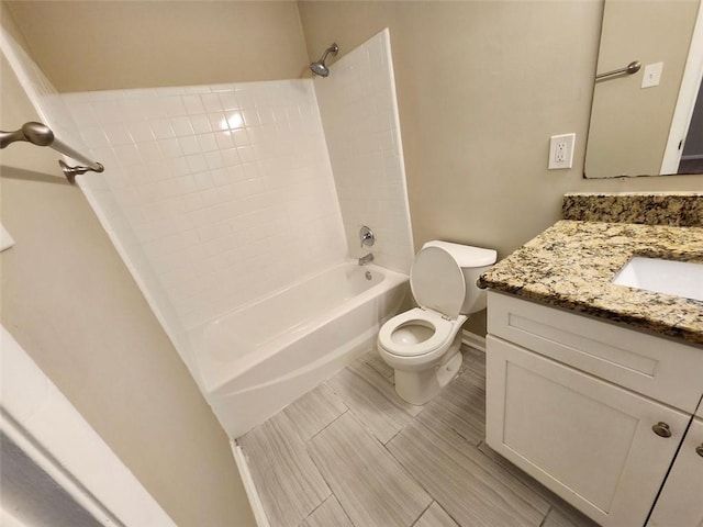 full bathroom with toilet, bathing tub / shower combination, and vanity