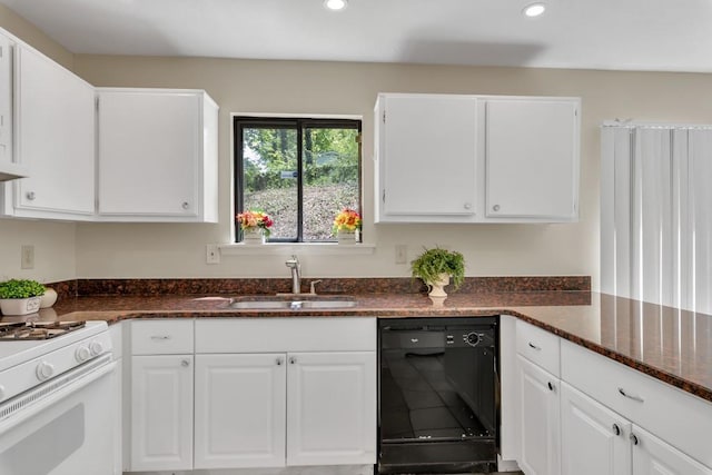 kitchen featuring a sink, white range with gas stovetop, white cabinetry, and dishwasher