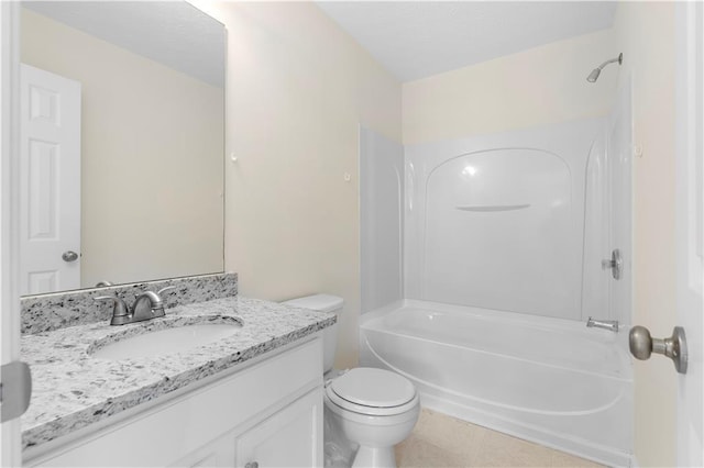 bathroom featuring toilet, vanity, tile patterned floors, and shower / tub combination