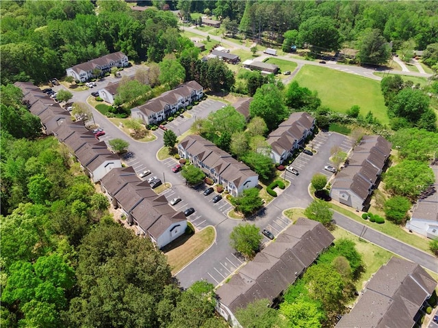 birds eye view of property with a residential view