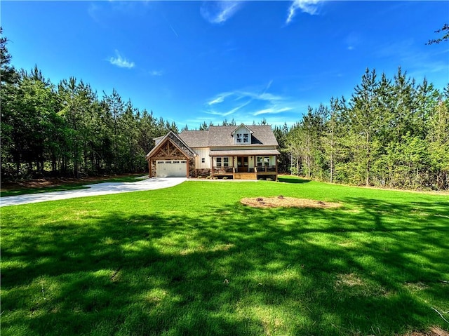 136 Rainey Rd, Temple, GA 30179 - view of front of house featuring driveway, an attached garage, a front yard, stone siding, and covered porch