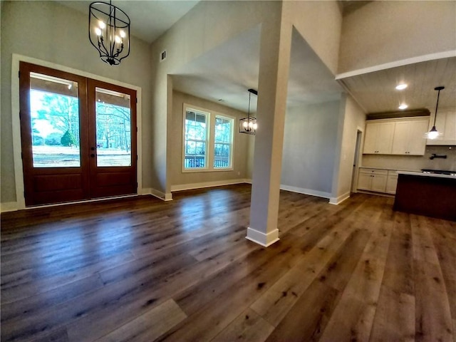 136 Rainey Rd, Temple, GA 30179 - foyer entrance with a chandelier, french doors, dark wood-style flooring, and recessed lighting