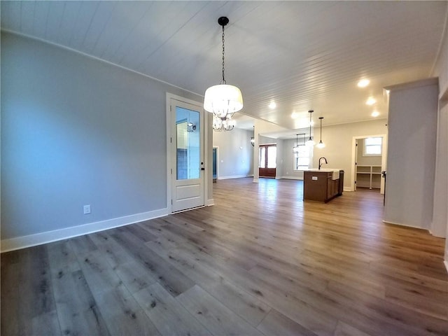 136 Rainey Rd, Temple, GA 30179 - unfurnished living room featuring a chandelier, dark wood-type flooring, and wooden ceiling