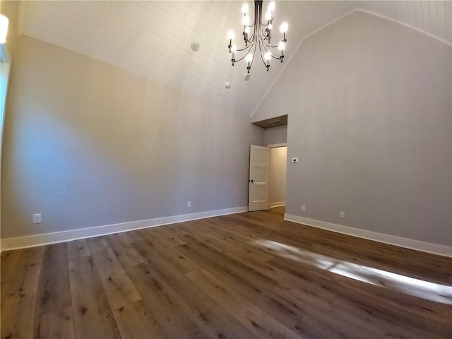 136 Rainey Rd, Temple, GA 30179 - unfurnished dining area featuring a chandelier, wood finished floors, and high vaulted ceiling