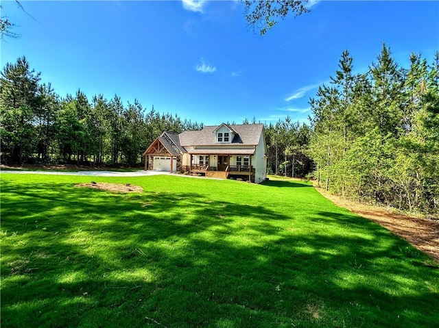 136 Rainey Rd, Temple, GA 30179 - view of front of house with an attached garage, a front yard, a porch, and driveway