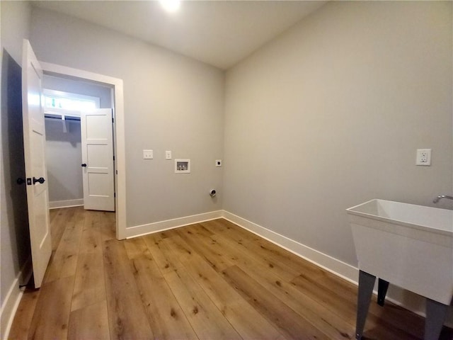 136 Rainey Rd, Temple, GA 30179 - washroom featuring electric dryer hookup, hookup for a washing machine, and light wood-style floors