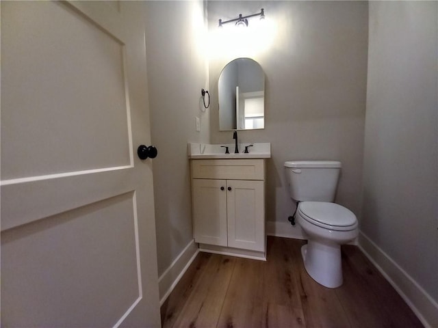 136 Rainey Rd, Temple, GA 30179 - half bath featuring wood finished floors and vanity