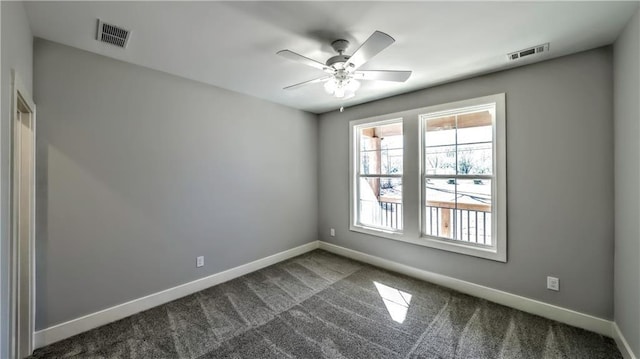 136 Rainey Rd, Temple, GA 30179 - spare room featuring dark colored carpet and a ceiling fan