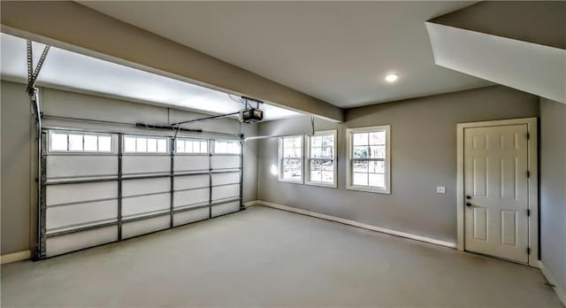 136 Rainey Rd, Temple, GA 30179 - garage featuring a garage door opener and recessed lighting