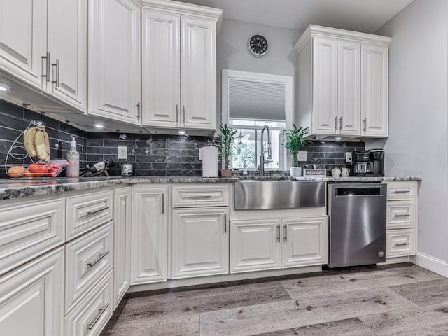 430 Cajun Dr, Ellijay, GA 30540 - kitchen featuring stainless steel dishwasher, light wood-type flooring, white cabinets, and tasteful backsplash