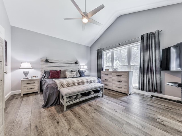 430 Cajun Dr, Ellijay, GA 30540 - bedroom with wood finished floors, a ceiling fan, and high vaulted ceiling