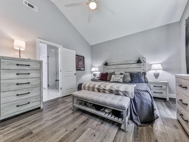430 Cajun Dr, Ellijay, GA 30540 - bedroom with wood finished floors, high vaulted ceiling, ceiling fan, and ensuite bath