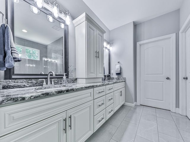 430 Cajun Dr, Ellijay, GA 30540 - full bath featuring double vanity, a tile shower, and marble look tiles