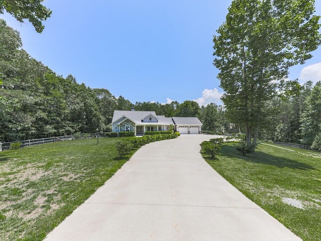 430 Cajun Dr, Ellijay, GA 30540 - ranch-style home featuring driveway, an attached garage, and view of scattered trees
