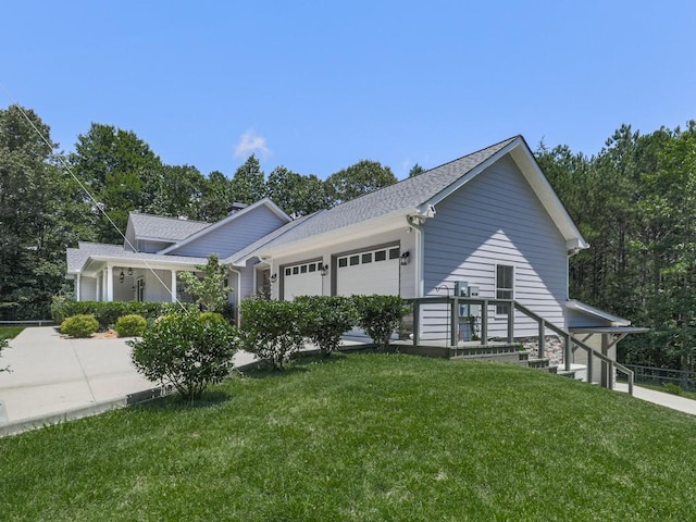 430 Cajun Dr, Ellijay, GA 30540 - view of property exterior with a lawn, an attached garage, and a shingled roof