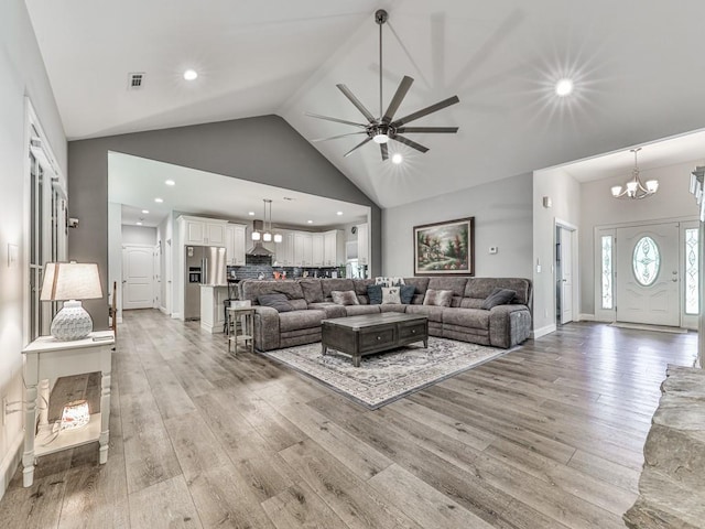 430 Cajun Dr, Ellijay, GA 30540 - living area with a chandelier, a ceiling fan, light wood finished floors, recessed lighting, and high vaulted ceiling