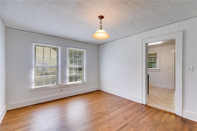 1834 Broad Ave, Atlanta, GA 30344 - spare room featuring wood finished floors and baseboards