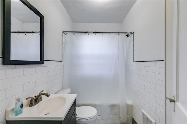 1834 Broad Ave, Atlanta, GA 30344 - bathroom with tile walls, toilet, vanity, and shower / tub combo with curtain
