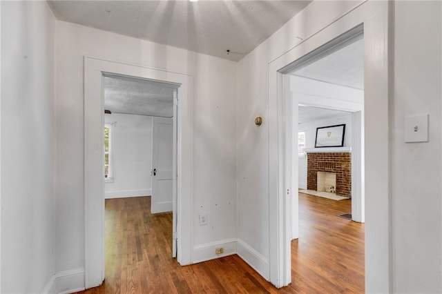 1834 Broad Ave, Atlanta, GA 30344 - hall featuring dark wood-style flooring and baseboards