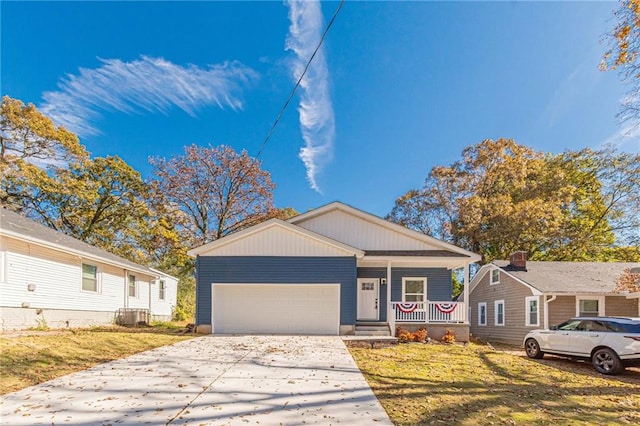 view of front of house featuring central AC, a front yard, and covered porch