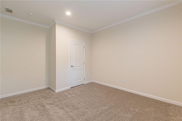 unfurnished room featuring carpet and ornamental molding