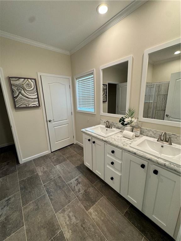 bathroom with vanity, ornamental molding, and walk in shower