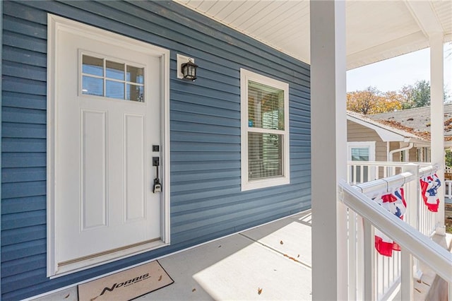 entrance to property with a porch