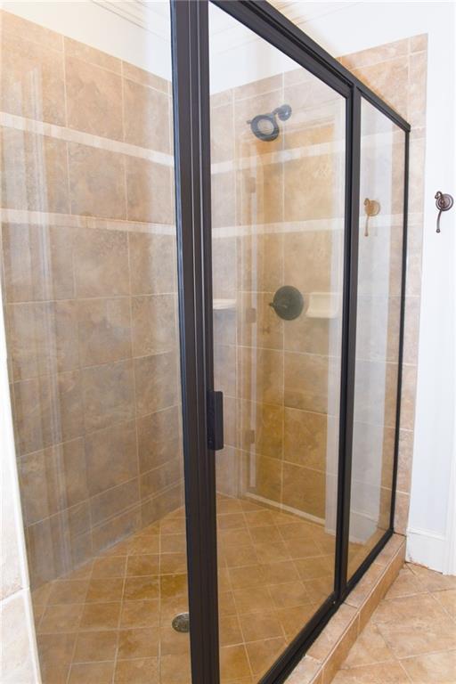 bathroom featuring walk in shower