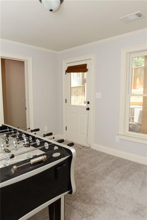 bedroom featuring light carpet and crown molding