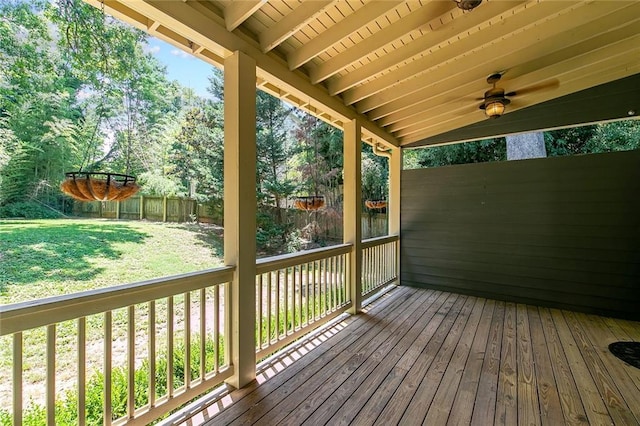 wooden terrace with a yard