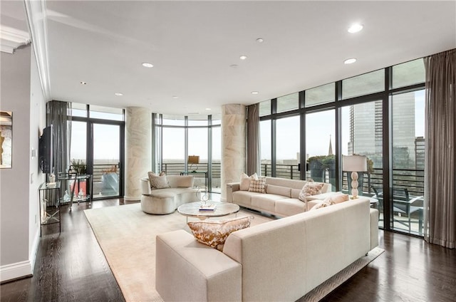 750 Park Ave NE Unit 19E, Atlanta, GA 30326 - living area with a wall of windows, baseboards, recessed lighting, and dark wood-style flooring
