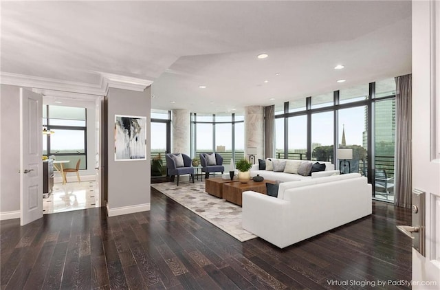 750 Park Ave NE Unit 19E, Atlanta, GA 30326 - living area with plenty of natural light, wood finished floors, and expansive windows