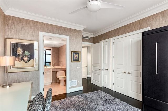 750 Park Ave NE Unit 19E, Atlanta, GA 30326 - bedroom with visible vents, crown molding, and wallpapered walls