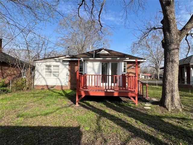 35 Elmwood St, Rome, GA 30161 - back of house featuring crawl space, a wooden deck, fence, and a lawn